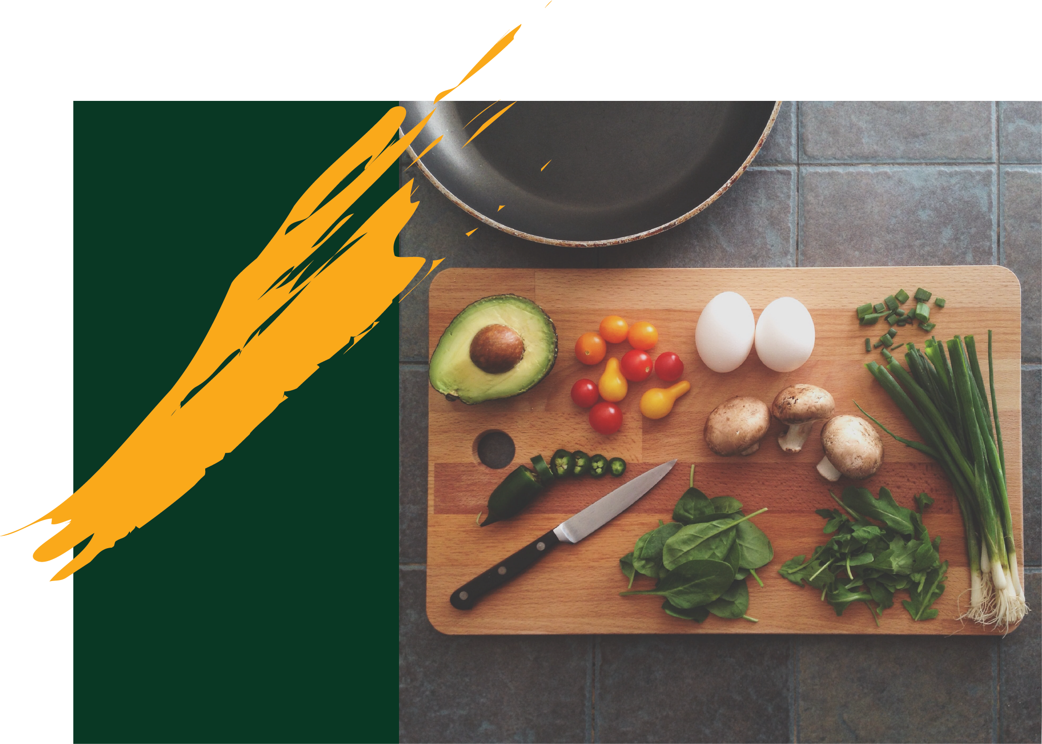Vegetables and knife on a cutting board