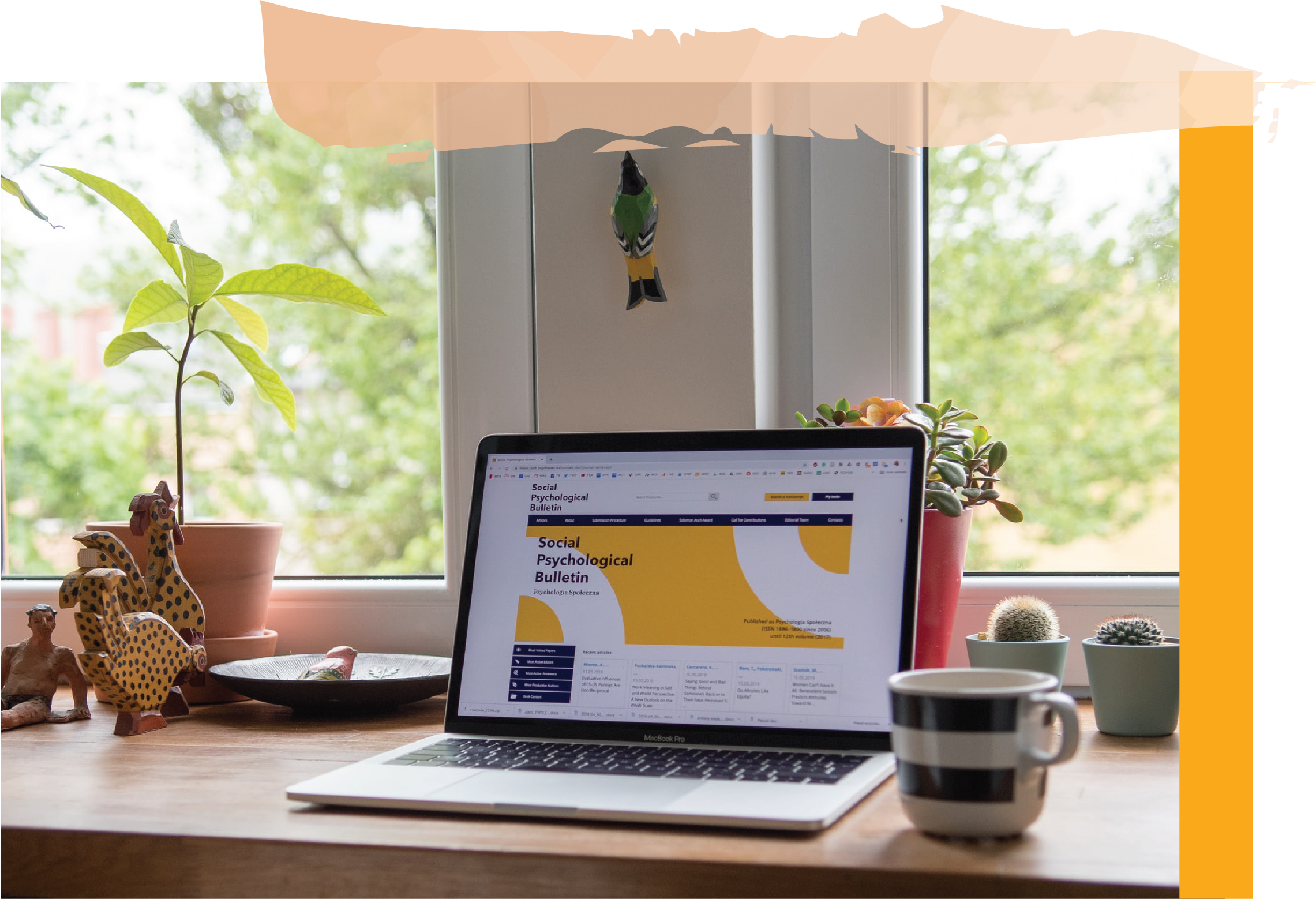 Laptop and notebook on a desk